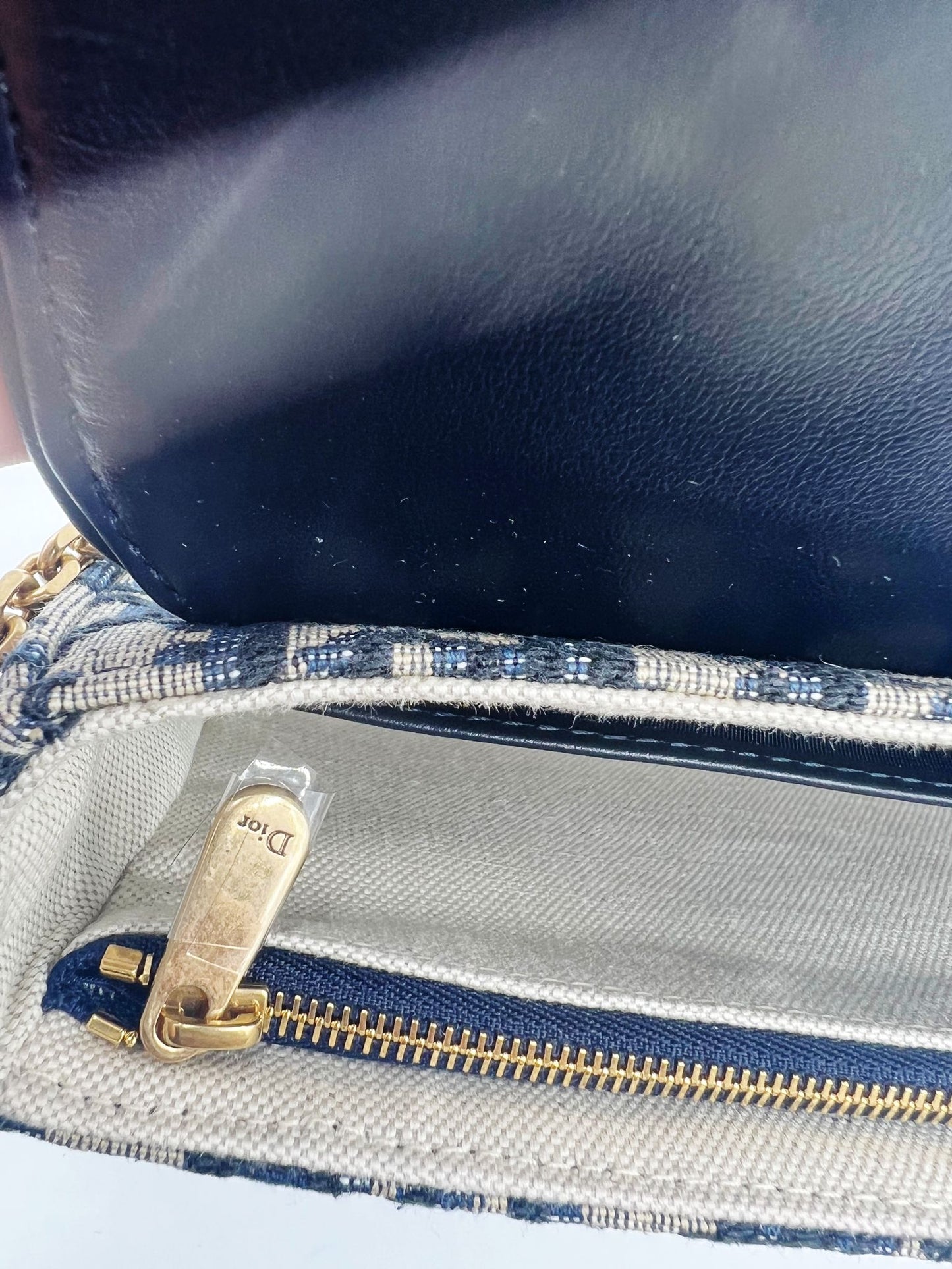 Saddle crossbody clutch