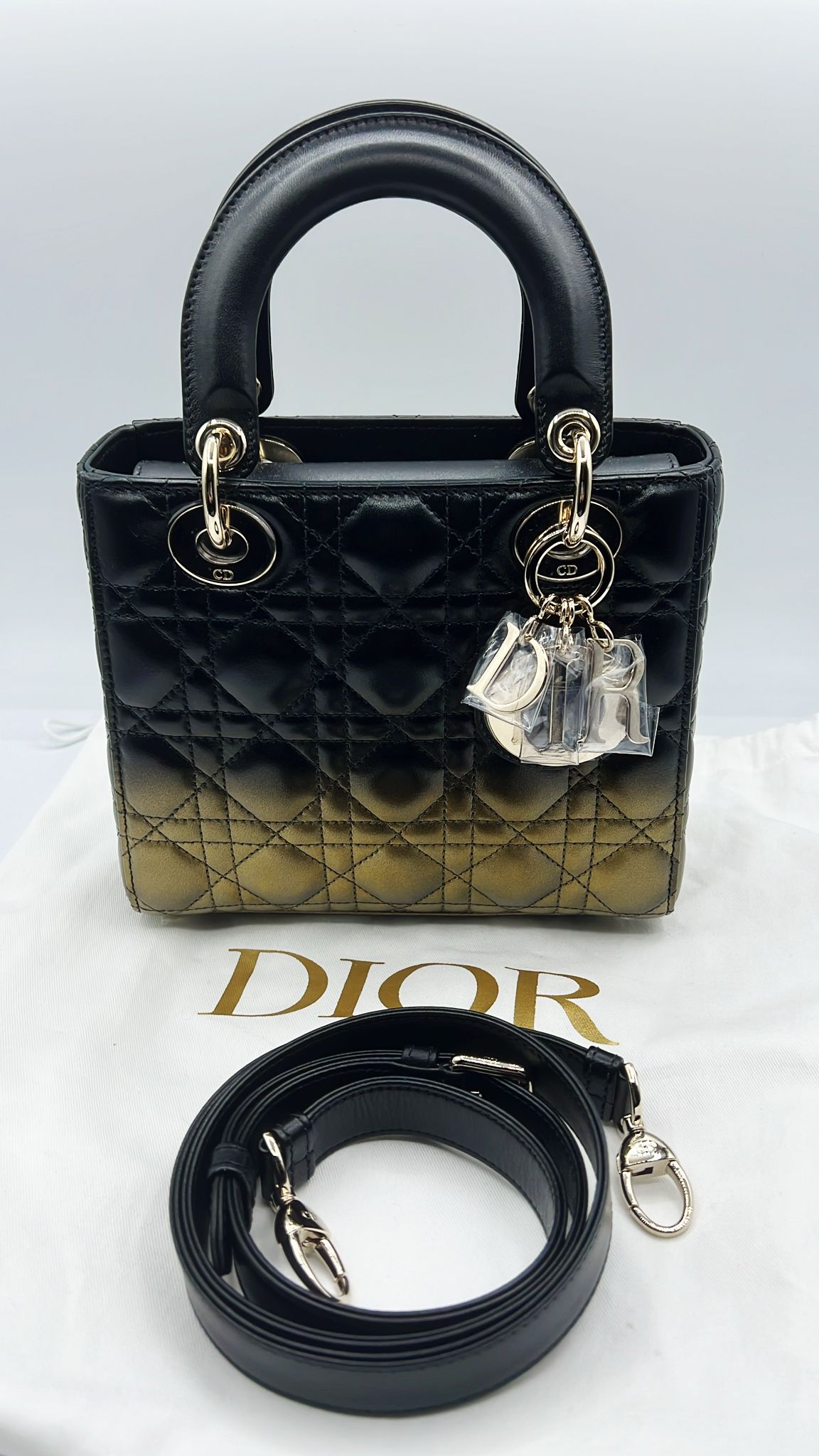 Dior lady size small lambskin leather black/gold