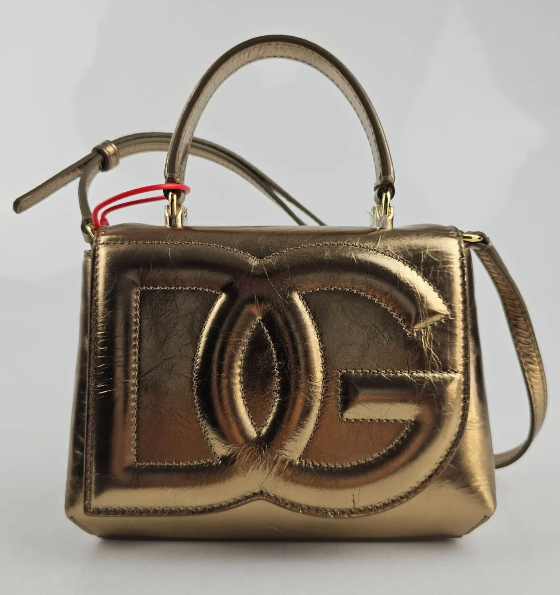 DG gold bag with handle