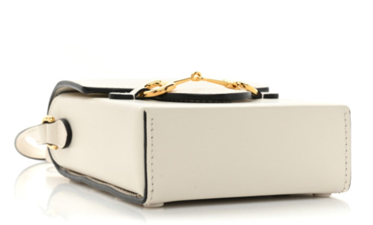 GUCCI
Boarded Plutone Calfskin Mini Horsebit 1955 Crossbody Bag White