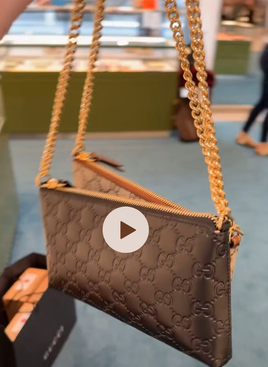 Gucci gg leather clutch